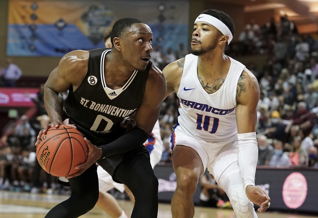 Nov 18, 2021; Charleston, South Carolina, USA; St. Bonaventure Bonnies guard Kyle Lofton (0) looks for a shot over Boise State Broncos guard Marcus Shaver Jr. (10) at TD Arena. Mandatory Credit: David Yeazell-USA TODAY Sports