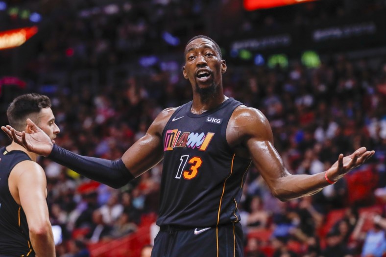 Nov 18, 2021; Miami, Florida, USA; Miami Heat center Bam Adebayo (13) reacts from the court against the Washington Wizards during the fourth quarter of the game at FTX Arena. Mandatory Credit: Sam Navarro-USA TODAY Sports