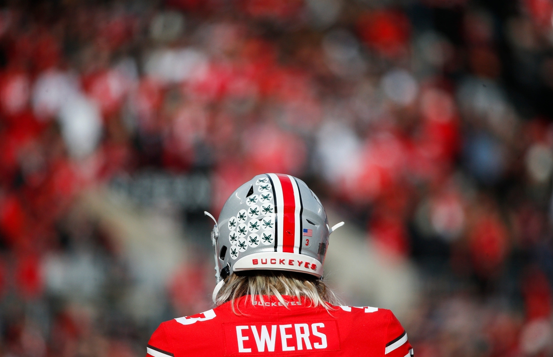 Sat., Nov. 20, 2021; Columbus, Ohio, USA; Ohio State Buckeyes quarterback Quinn Ewers (3) practices on the sideline during a break in play in the second quarter of a NCAA Division I football game between the Ohio State Buckeyes and the Michigan State Spartans at Ohio Stadium. Mandatory Credit: Joshua A. Bickel/Columbus Dispatch via USA TODAY Network.

Cfb Michigan State Spartans At Ohio State Buckeyes