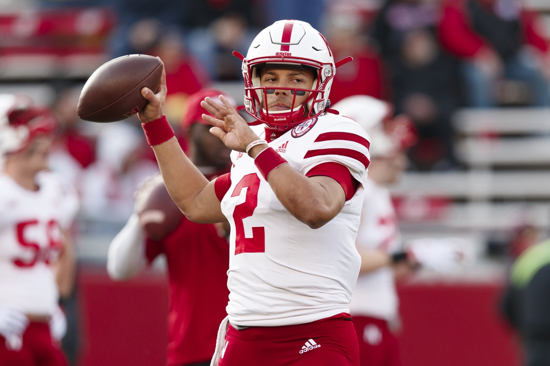 Nov 20, 2021; Madison, Wisconsin, USA;  Nebraska Cornhuskers quarterback Adrian Martinez (2) throws a pass during warmups prior to the game against the Wisconsin Badgers at Camp Randall Stadium. Mandatory Credit: Jeff Hanisch-USA TODAY Sports