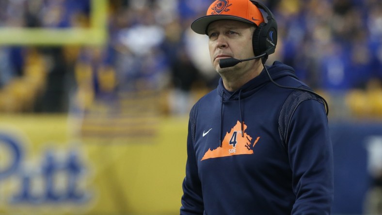 Nov 20, 2021; Pittsburgh, Pennsylvania, USA;  Virginia Cavaliers head coach Bronco Mendenhall looks on from the sidelines against the Pittsburgh Panthers during the second quarter at Heinz Field. Mandatory Credit: Charles LeClaire-USA TODAY Sports