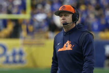 Nov 20, 2021; Pittsburgh, Pennsylvania, USA;  Virginia Cavaliers head coach Bronco Mendenhall looks on from the sidelines against the Pittsburgh Panthers during the second quarter at Heinz Field. Mandatory Credit: Charles LeClaire-USA TODAY Sports