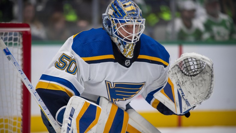 Nov 20, 2021; Dallas, Texas, USA; St. Louis Blues goaltender Jordan Binnington (50) faces the Dallas Stars attack during the second period at the American Airlines Center. Mandatory Credit: Jerome Miron-USA TODAY Sports