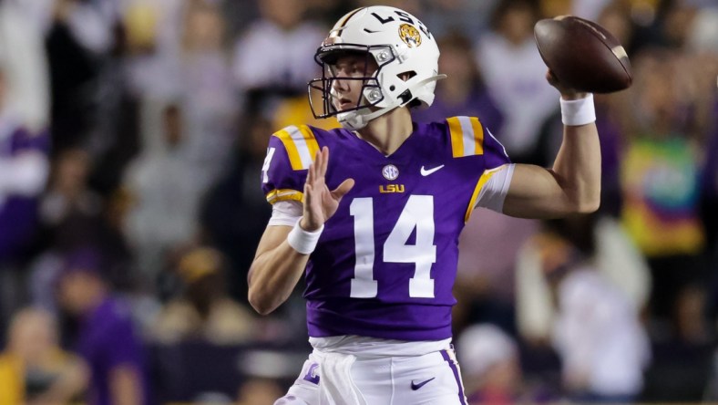 Nov 20, 2021; Baton Rouge, Louisiana, USA;  LSU Tigers quarterback Max Johnson (14) passes the ball against Louisiana Monroe Warhawks during the first half at Tiger Stadium. Mandatory Credit: Stephen Lew-USA TODAY Sports