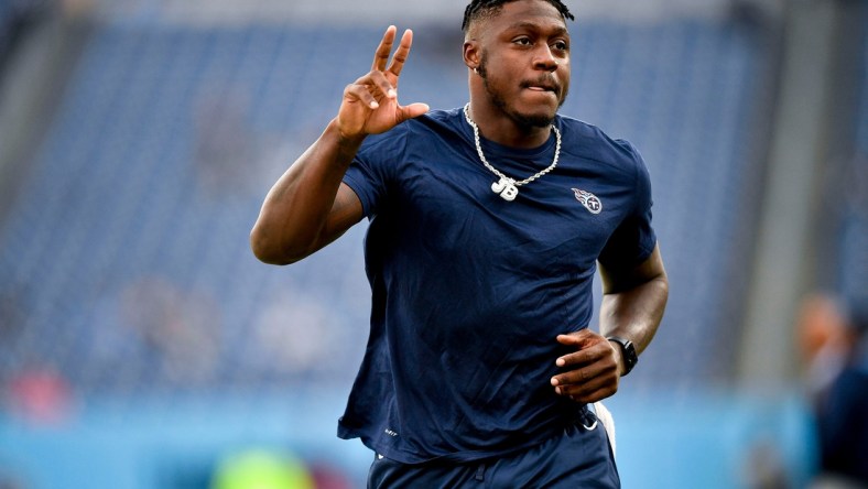 Tennessee Titans wide receiver A.J. Brown (11) runs on the field during warmups before they face the Texans at Nissan Stadium Sunday, Nov. 21, 2021 in Nashville, Tenn.Titans Texans 0100