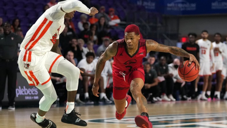 Nov 24, 2021; Fort Myers, Florida, USA; Southern Utah Thunderbirds guard John Knight III (3) drives the ball around Bowling Green Falcons guard Daeqwon Plowden (25) during the second half at Suncoast Credit Union Arena. Mandatory Credit: Jasen Vinlove-USA TODAY Sports