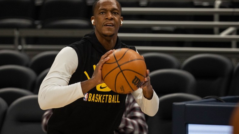 Nov 24, 2021; Indianapolis, Indiana, USA; Los Angeles Lakers guard Rajon Rondo (4) warms up before the game against the Indiana Pacers at Gainbridge Fieldhouse. Mandatory Credit: Trevor Ruszkowski-USA TODAY Sports