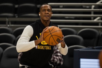 Nov 24, 2021; Indianapolis, Indiana, USA; Los Angeles Lakers guard Rajon Rondo (4) warms up before the game against the Indiana Pacers at Gainbridge Fieldhouse. Mandatory Credit: Trevor Ruszkowski-USA TODAY Sports