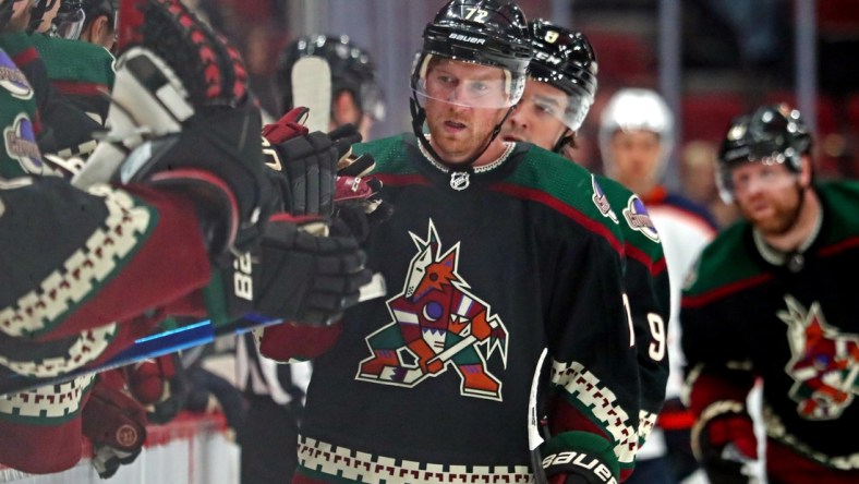 Nov 24, 2021; Glendale, Arizona, USA; Arizona Coyotes center Travis Boyd (72) celebrates after scoring a goal during the third period against the Edmonton Oilers at Gila River Arena. Mandatory Credit: Mark J. Rebilas-USA TODAY Sports