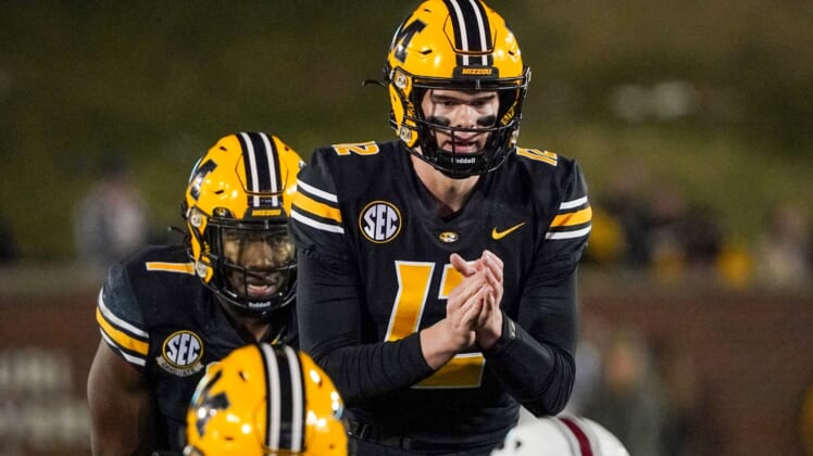 Nov 13, 2021; Columbia, Missouri, USA; Missouri Tigers quarterback Brady Cook (12) readies for the snap against the South Carolina Gamecocks during the game at Faurot Field at Memorial Stadium. Mandatory Credit: Denny Medley-USA TODAY Sports