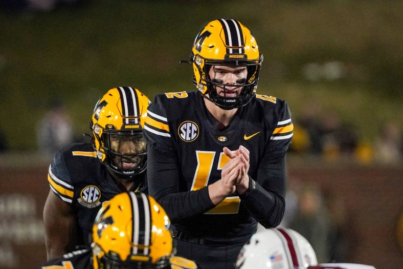 Nov 13, 2021; Columbia, Missouri, USA; Missouri Tigers quarterback Brady Cook (12) readies for the snap against the South Carolina Gamecocks during the game at Faurot Field at Memorial Stadium. Mandatory Credit: Denny Medley-USA TODAY Sports