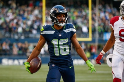 Nov 21, 2021; Seattle, Washington, USA; Seattle Seahawks wide receiver Tyler Lockett (16) runs out of bounds following a reception against the Arizona Cardinals during the fourth quarter at Lumen Field. Mandatory Credit: Joe Nicholson-USA TODAY Sports