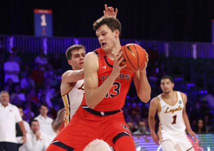 Nov 25, 2021; Nassau, BHS; Auburn Tigers forward Walker Kessler (13) looks to score as Loyola Ramblers guard Braden Norris (4) defends during the second half in the 2021 Battle 4 Atlantis at Imperial Arena. Mandatory Credit: Kevin Jairaj-USA TODAY Sports