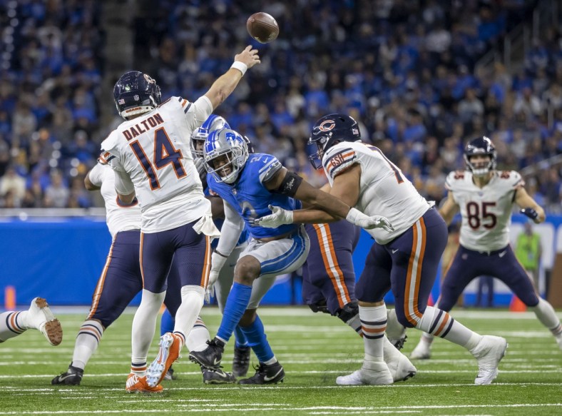 Nov 25, 2021; Detroit, Michigan, USA; Chicago Bears quarterback Andy Dalton (14) throws a pass against the Detroit Lions in the second half at Ford Field. Mandatory Credit: David Reginek-USA TODAY Sports