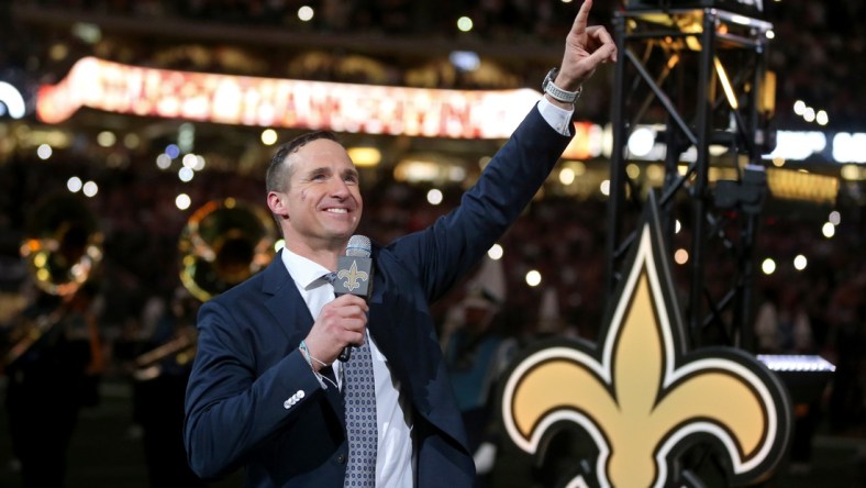 Nov 25, 2021; New Orleans, Louisiana, USA; Former New Orleans Saints quarterback Drew Brees is honored at halftime of the game between the New Orleans Saints and the Buffalo Bills at the Caesars Superdome. Mandatory Credit: Chuck Cook-USA TODAY Sports