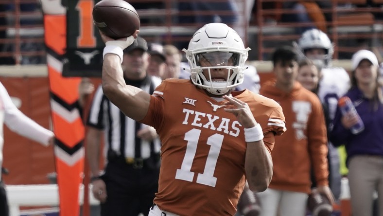 Nov 26, 2021; Austin, Texas, USA; Texas Longhorns quarterback Casey Thompson (11) throws a pass during the first half against the Kansas State Wildcats at Darrell K Royal-Texas Memorial Stadium. Mandatory Credit: Scott Wachter-USA TODAY Sports