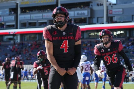 Nov 26, 2021; Carson, California, USA; San Diego State Aztecs quarterback Jordon Brookshire (4) celebrates after scoring a touchdown against the Boise State Broncos in the second half at Dignity Health Sports Park. San Diego State defeated Boise State 27-16. Mandatory Credit: Kirby Lee-USA TODAY Sports