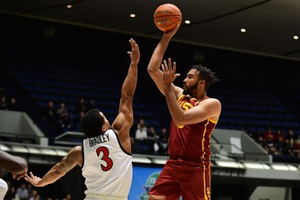 Nov 26, 2021; Anaheim, CA, USA; Southern California Trojans forward Isaiah Mobley (3) shoots against San Diego State Aztecs guard Matt Bradley (3) during the first half of the Wooden Legacy at Anaheim Arena. Mandatory Credit: Gary A. Vasquez-USA TODAY Sports