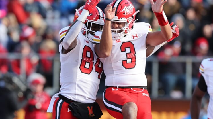 Nov 27, 2021; Piscataway, New Jersey, USA; Maryland Terrapins tight end Corey Dyches (84) celebrates his touchdown with quarterback Taulia Tagovailoa (3) during the second half against the Rutgers Scarlet Knights at SHI Stadium. Mandatory Credit: Vincent Carchietta-USA TODAY Sports