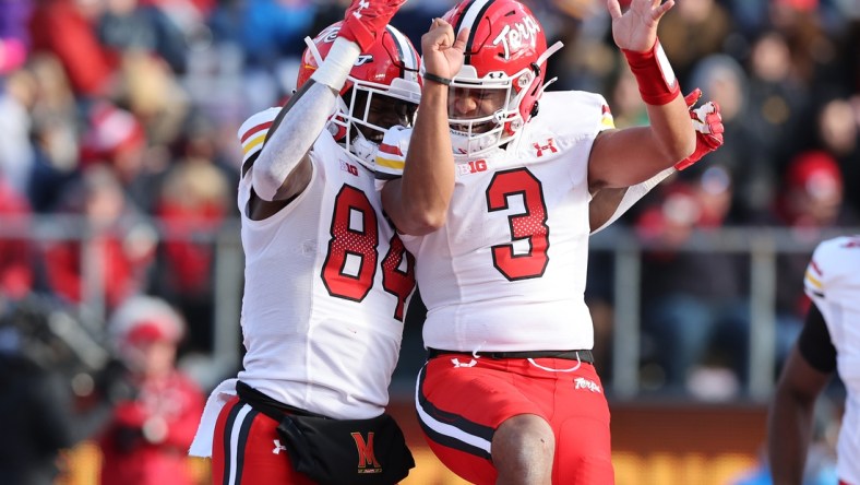 Nov 27, 2021; Piscataway, New Jersey, USA; Maryland Terrapins tight end Corey Dyches (84) celebrates his touchdown with quarterback Taulia Tagovailoa (3) during the second half against the Rutgers Scarlet Knights at SHI Stadium. Mandatory Credit: Vincent Carchietta-USA TODAY Sports