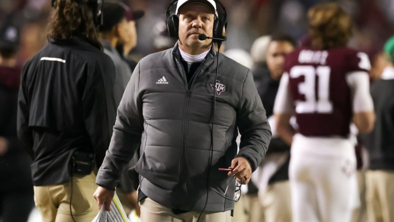 Nov 27, 2021; Baton Rouge, Louisiana, USA;  Texas A&M Aggies head coach Jimbo Fisher looks on during the first half against the LSU Tigers at Tiger Stadium. Mandatory Credit: Stephen Lew-USA TODAY Sports