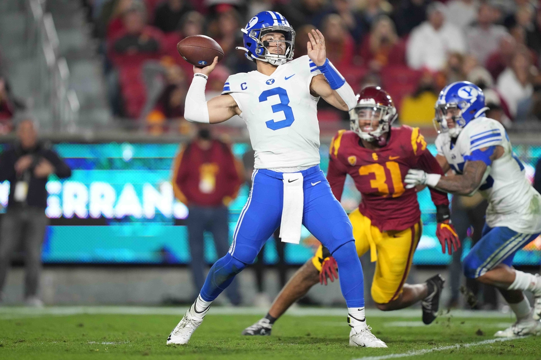 Nov 27, 2021; Los Angeles, California, USA; BYU Cougars quarterback Jaren Hall (3) throws the ball against the Southern California Trojans in the first half at United Airlines Field at Los Angeles Memorial Coliseum. Mandatory Credit: Kirby Lee-USA TODAY Sports