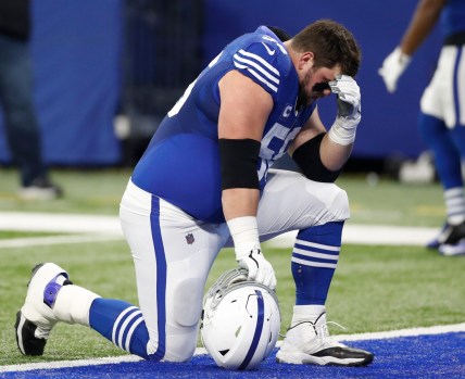 Indianapolis Colts guard Quenton Nelson (56) kneels in prayer pregame Sunday, Nov. 28, 2021, before a game against the Tampa Bay Buccaneers at Lucas Oil Stadium in Indianapolis.