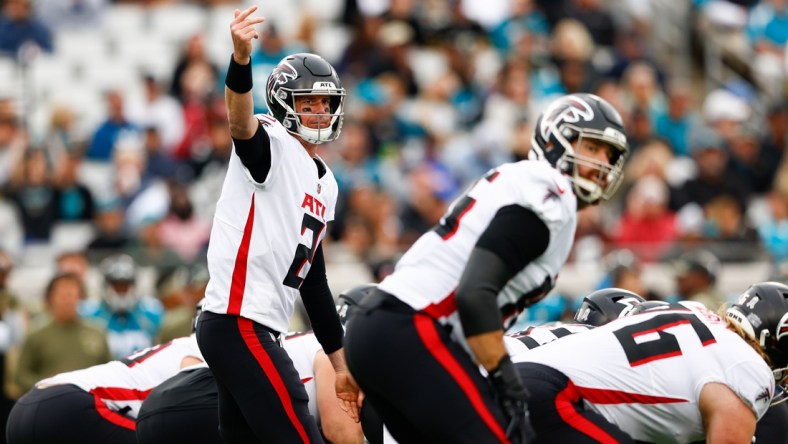 Nov 28, 2021; Jacksonville, Florida, USA;  Atlanta Falcons quarterback Matt Ryan (2) calls a play at the line against the Jacksonville Jaguars in the first quarter at TIAA Bank Field. Mandatory Credit: Nathan Ray Seebeck-USA TODAY Sports