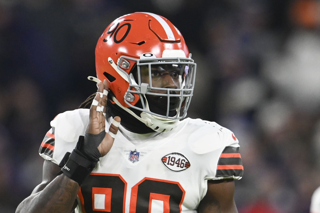 Nov 28, 2021; Baltimore, Maryland, USA;  Cleveland Browns defensive end Jadeveon Clowney (90) look sot the bench during the first half against the Baltimore Ravens at M&T Bank Stadium. Mandatory Credit: Tommy Gilligan-USA TODAY Sports