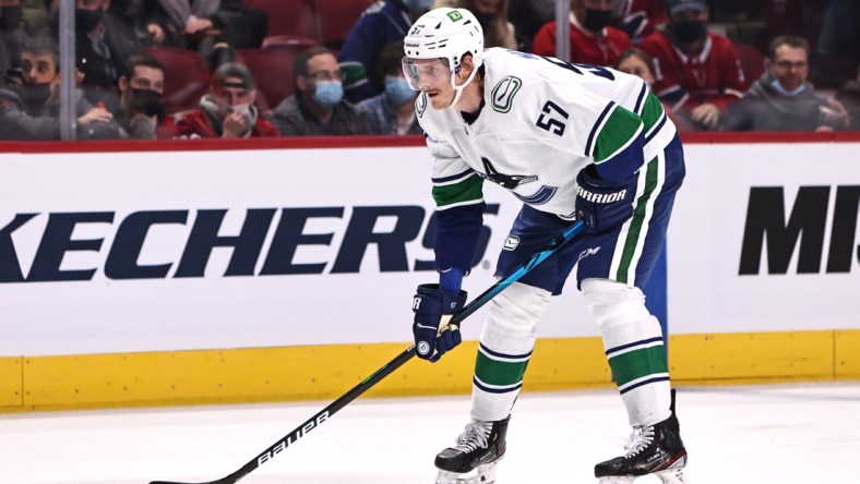 Nov 29, 2021; Montreal, Quebec, CAN; Vancouver Canucks defenseman Tyler Myers (57) during a first period face-off against Montreal Canadiens at Bell Centre. Mandatory Credit: Jean-Yves Ahern-USA TODAY Sports