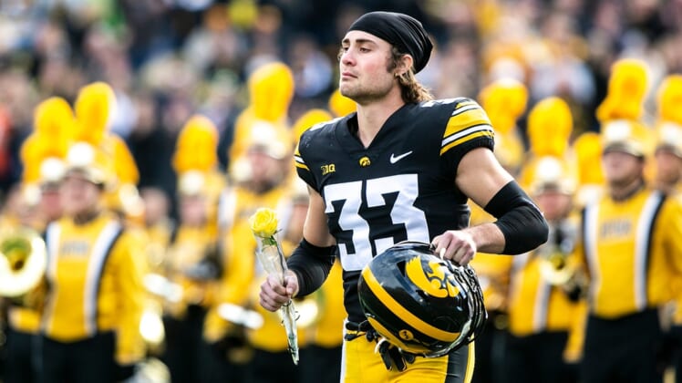 Iowa defensive back Riley Moss (33) is acknowledged during a senior day ceremony before a NCAA Big Ten Conference football game against Illinois, Saturday, Nov. 20, 2021, at Kinnick Stadium in Iowa City, Iowa.211120 Illinois Iowa Fb 064 Jpg