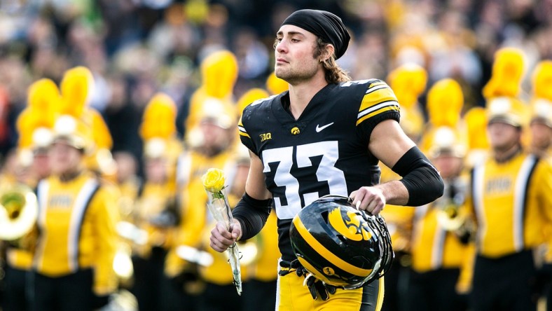 Iowa defensive back Riley Moss (33) is acknowledged during a senior day ceremony before a NCAA Big Ten Conference football game against Illinois, Saturday, Nov. 20, 2021, at Kinnick Stadium in Iowa City, Iowa.

211120 Illinois Iowa Fb 064 Jpg