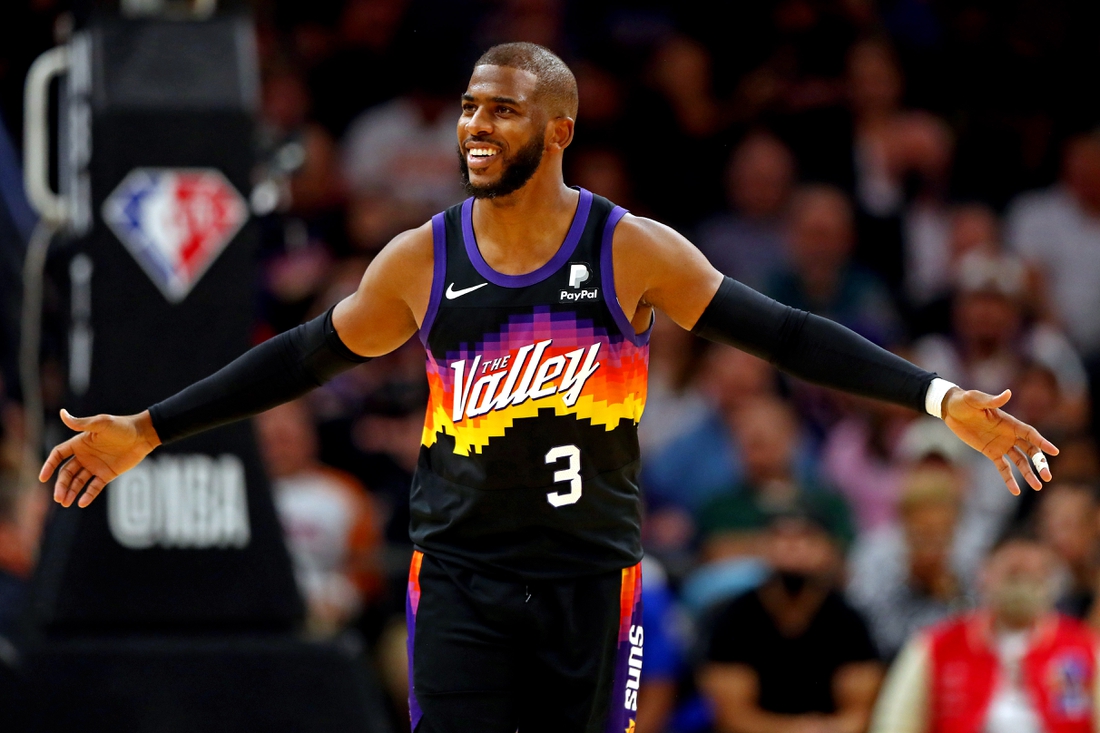 Nov 30, 2021; Phoenix, Arizona, USA; Phoenix Suns guard Chris Paul (3) reacts during the second quarter against the Golden State Warriors at Footprint Center. Mandatory Credit: Mark J. Rebilas-USA TODAY Sports