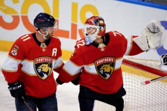 Nov 30, 2021; Sunrise, Florida, USA; Florida Panthers left wing Jonathan Huberdeau (11) talks with goaltender Sergei Bobrovsky (72) during the third period against the Washington Capitals at FLA Live Arena. Mandatory Credit: Jasen Vinlove-USA TODAY Sports