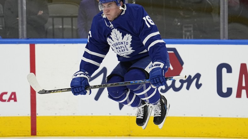 Dec 1, 2021; Toronto, Ontario, CAN; Toronto Maple Leafs forward Mitchell Marner (16) jumps during warm-up before a game against the Colorado Avalanche at Scotiabank Arena. Mandatory Credit: John E. Sokolowski-USA TODAY Sports