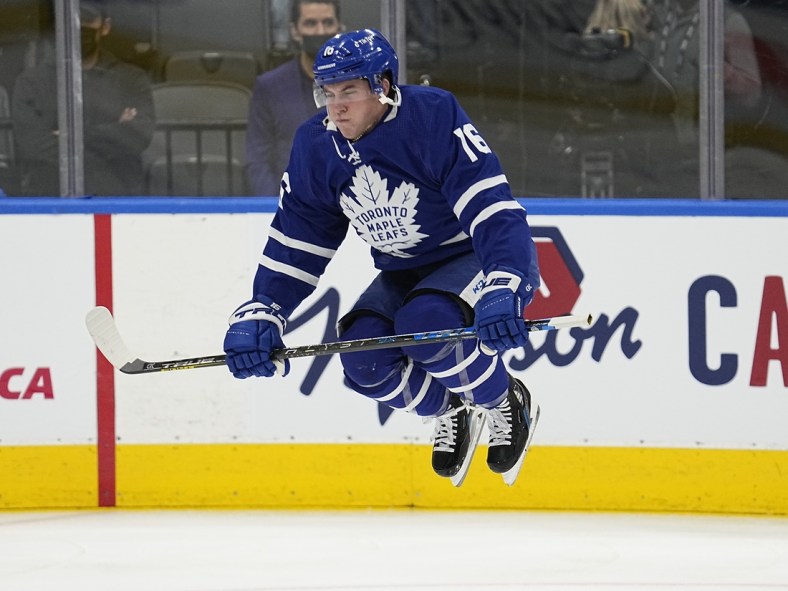 Dec 1, 2021; Toronto, Ontario, CAN; Toronto Maple Leafs forward Mitchell Marner (16) jumps during warm-up before a game against the Colorado Avalanche at Scotiabank Arena. Mandatory Credit: John E. Sokolowski-USA TODAY Sports