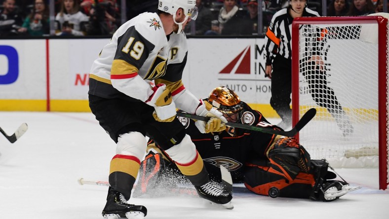 December 1, 2021; Anaheim, California, USA; Anaheim Ducks goaltender Anthony Stolarz (41) blocks a shot against Vegas Golden Knights right wing Reilly Smith (19) during the first period at Honda Center. Mandatory Credit: Gary A. Vasquez-USA TODAY Sports