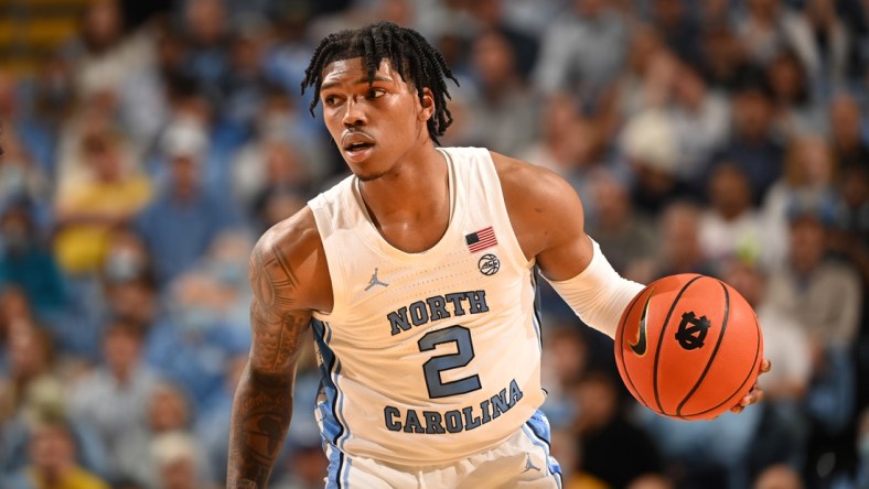 Dec 1, 2021; Chapel Hill, North Carolina, USA;  North Carolina Tar Heels guard Caleb Love (2) with the ball in the second half at Dean E. Smith Center. Mandatory Credit: Bob Donnan-USA TODAY Sports