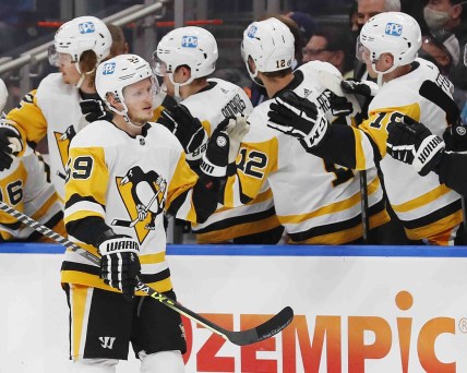 Dec 1, 2021; Edmonton, Alberta, CAN; Pittsburgh Penguins forward Jake Guentzel (59) celebrates a goal against the Edmonton Oilers during the first period at Rogers Place. Mandatory Credit: Perry Nelson-USA TODAY Sports