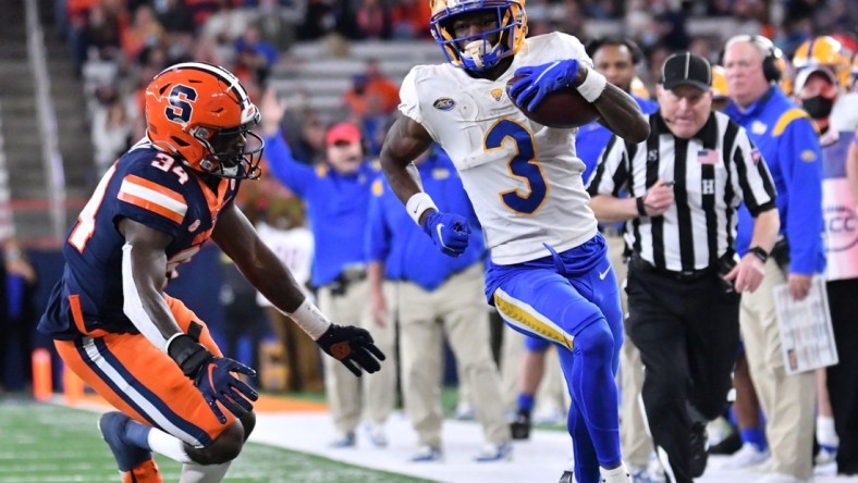 Nov 27, 2021; Syracuse, New York, USA; Pittsburgh Panthers wide receiver Jordan Addison (3) and Syracuse Orange defensive back Eric Coley (34) in the third quarter at the Carrier Dome. Mandatory Credit: Mark Konezny-USA TODAY Sports