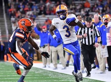 Nov 27, 2021; Syracuse, New York, USA; Pittsburgh Panthers wide receiver Jordan Addison (3) and Syracuse Orange defensive back Eric Coley (34) in the third quarter at the Carrier Dome. Mandatory Credit: Mark Konezny-USA TODAY Sports