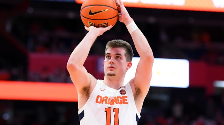 Nov 30, 2021; Syracuse, New York, USA; Syracuse Orange guard Joseph Girard III (11) shoots a free throw against the Indiana Hoosiers during the second half at the Carrier Dome. Mandatory Credit: Rich Barnes-USA TODAY Sports
