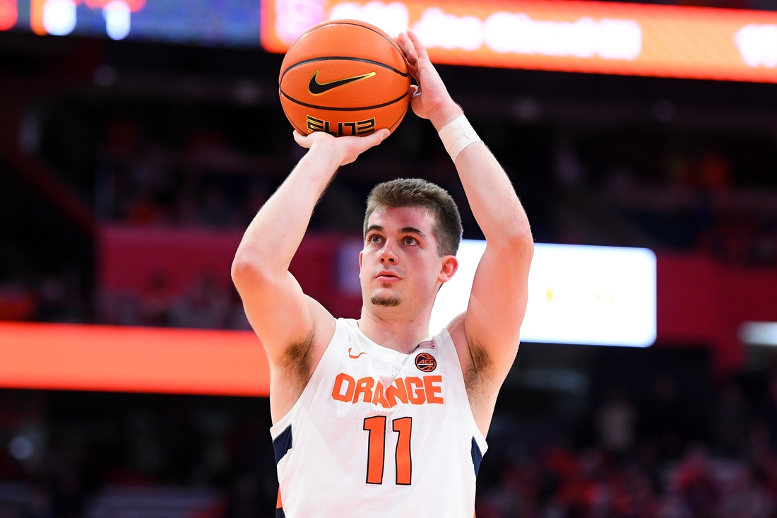 Nov 30, 2021; Syracuse, New York, USA; Syracuse Orange guard Joseph Girard III (11) shoots a free throw against the Indiana Hoosiers during the second half at the Carrier Dome. Mandatory Credit: Rich Barnes-USA TODAY Sports