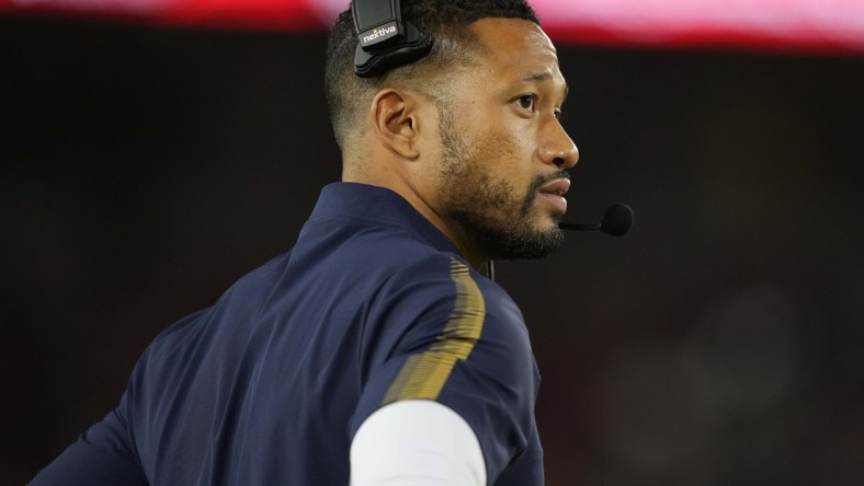 Nov 27, 2021; Stanford, California, USA; Notre Dame Fighting Irish defensive coordinator Marcus Freeman stands on the sideline during the second quarter against the Stanford Cardinal at Stanford Stadium. Mandatory Credit: Darren Yamashita-USA TODAY Sports