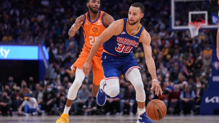 NBA roundup: Stephen Curry, Warriors halt Suns' 18-game win streak