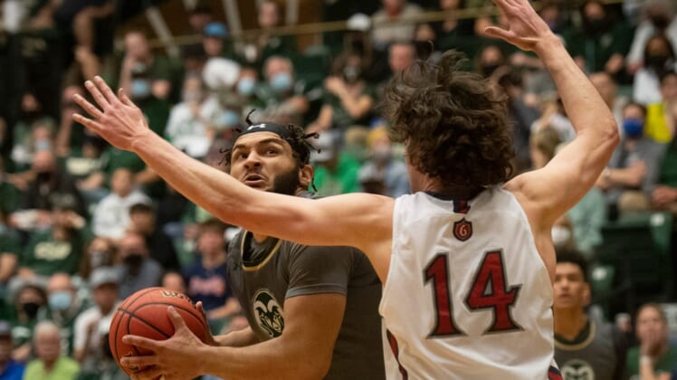 Colorado State Rams' David Roddy eyes the basket while defended by Saint Mary's Gaels Kyle Bowen, Saturday, Dec. 4, 2021, at Moby Arena.Ftc 1204 Ja Stmarys Csu Mbball 046