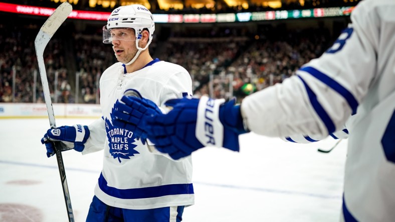 Dec 4, 2021; Saint Paul, Minnesota, USA; Toronto Maple Leafs forward Jason Spezza (19) celebrates his goal with teammates during the second period against the Minnesota Wild at Xcel Energy Center. Mandatory Credit: Brace Hemmelgarn-USA TODAY Sports