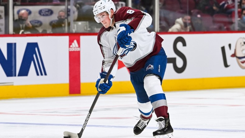 Dec 2, 2021; Montreal, Quebec, CAN; Colorado Avalanche defenceman Cale Makar (8) plays the puck during the third period at Bell Centre. Mandatory Credit: David Kirouac-USA TODAY Sports