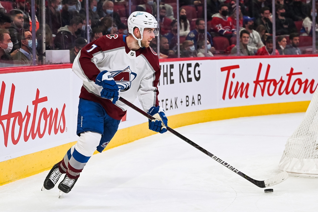 Dec 2, 2021; Montreal, Quebec, CAN; Colorado Avalanche defenceman Devon Toews (7) plays the puck during the second period at Bell Centre. Mandatory Credit: David Kirouac-USA TODAY Sports