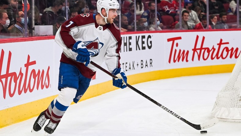 Dec 2, 2021; Montreal, Quebec, CAN; Colorado Avalanche defenceman Devon Toews (7) plays the puck during the second period at Bell Centre. Mandatory Credit: David Kirouac-USA TODAY Sports